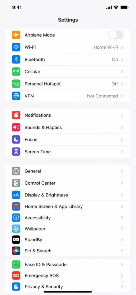 Screenshot of iPhone Settings app showing Screen Time option in the main settings menu
